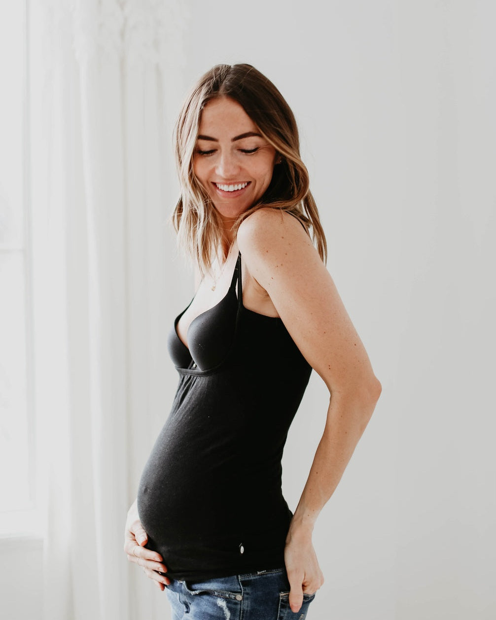 black naked nursing tank, model holding baby bump